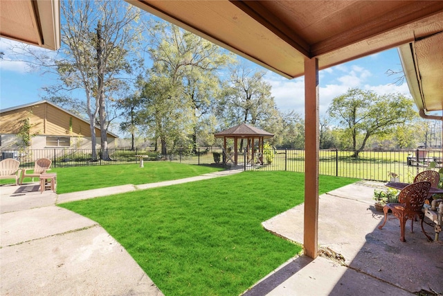 view of yard featuring a gazebo and a patio