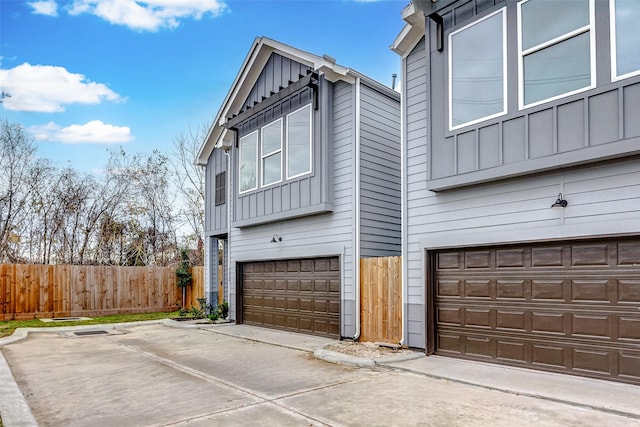 view of side of home featuring a garage