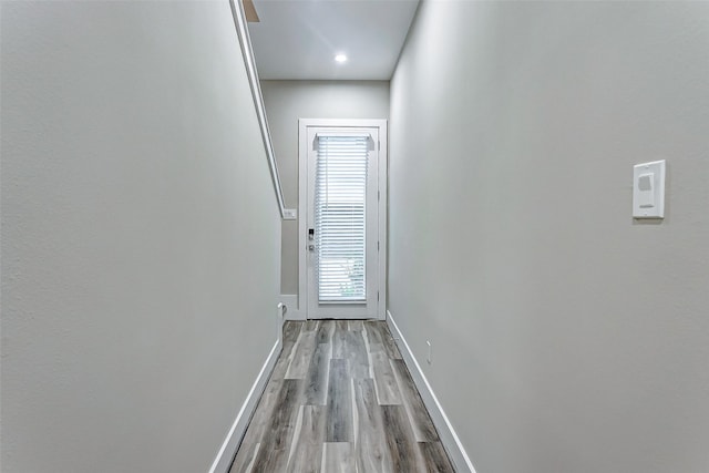 doorway to outside featuring light wood-type flooring