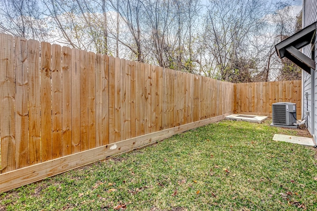 view of yard featuring central AC