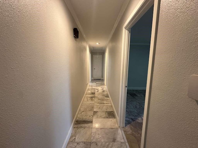 hallway featuring ornamental molding