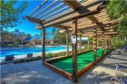 surrounding community featuring a pool and a pergola