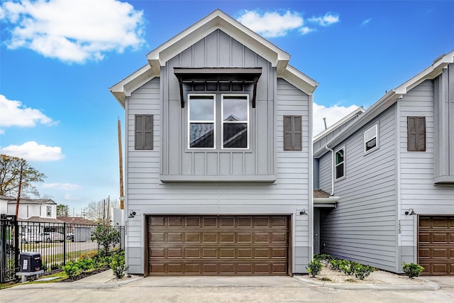 view of front of property featuring a garage