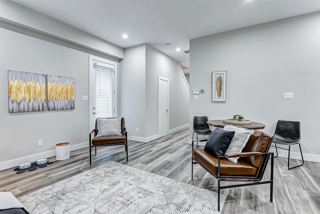 living area with light hardwood / wood-style floors