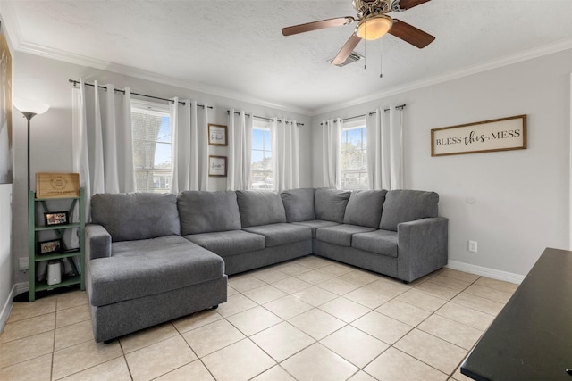 living room with ceiling fan, a textured ceiling, crown molding, and light tile patterned flooring