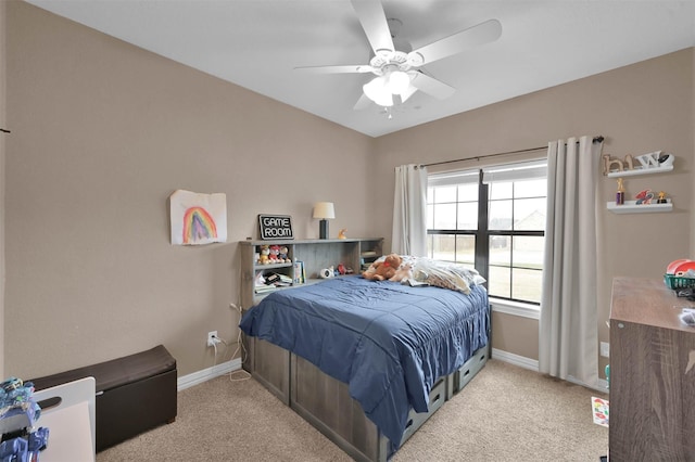 carpeted bedroom with ceiling fan