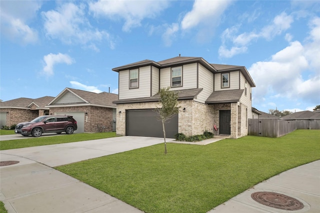 view of front facade featuring a garage and a front yard