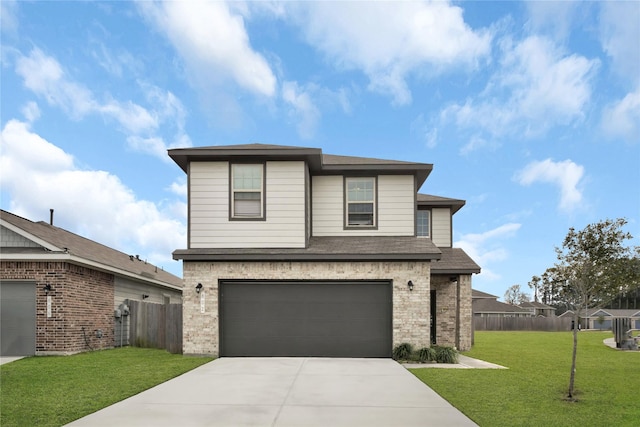 view of front of house with a front lawn and a garage