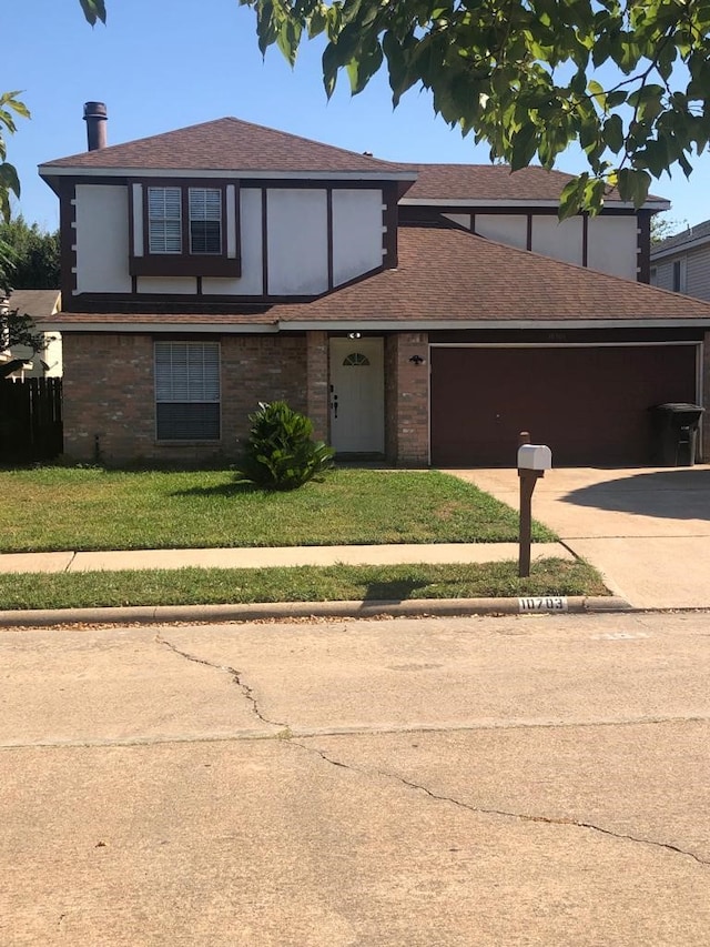 view of front of home featuring a front lawn