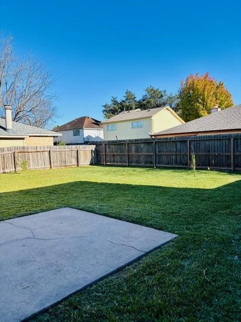 view of yard with a patio area