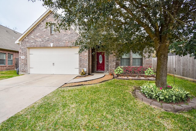 view of front of home with a garage and a front yard