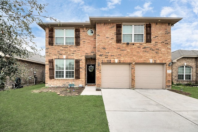 view of front of home with a garage and a front yard