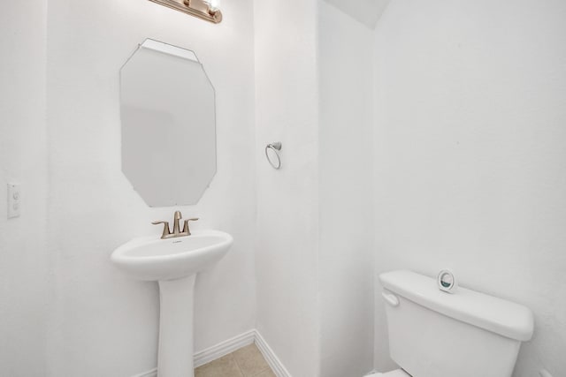 bathroom with sink and toilet