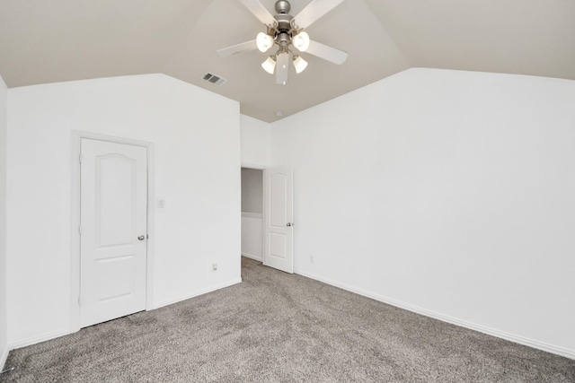 interior space with lofted ceiling, carpet floors, and ceiling fan