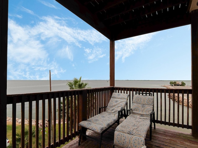 deck featuring a water view