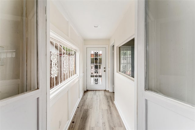 doorway to outside featuring light hardwood / wood-style floors