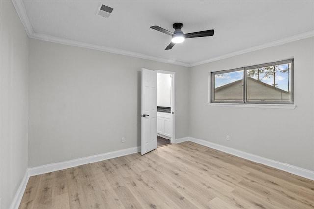 unfurnished bedroom featuring light wood-type flooring, ceiling fan, and ornamental molding