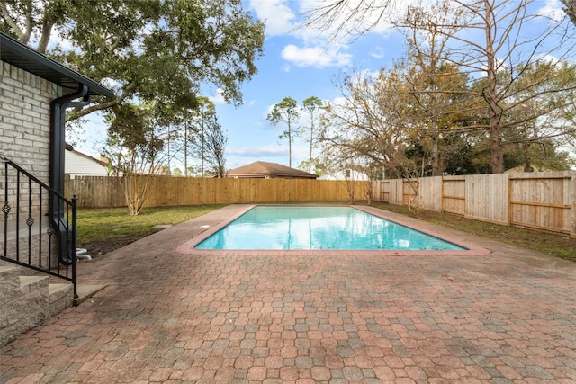 view of pool featuring a patio area