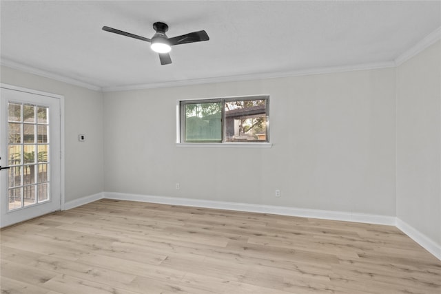 spare room featuring light hardwood / wood-style floors, crown molding, and ceiling fan