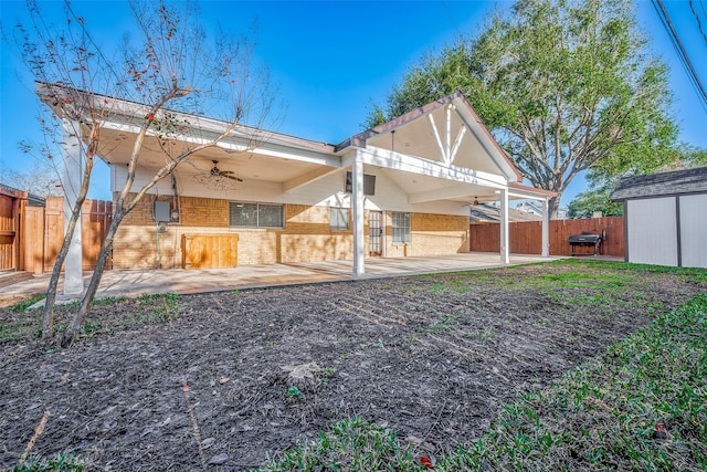 back of property with a patio