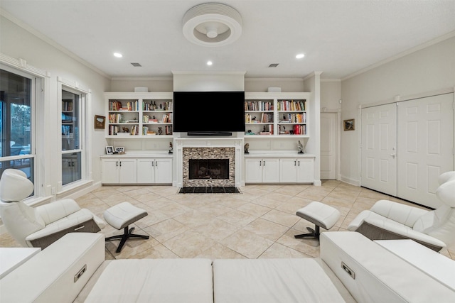 tiled living room with a tiled fireplace and ornamental molding