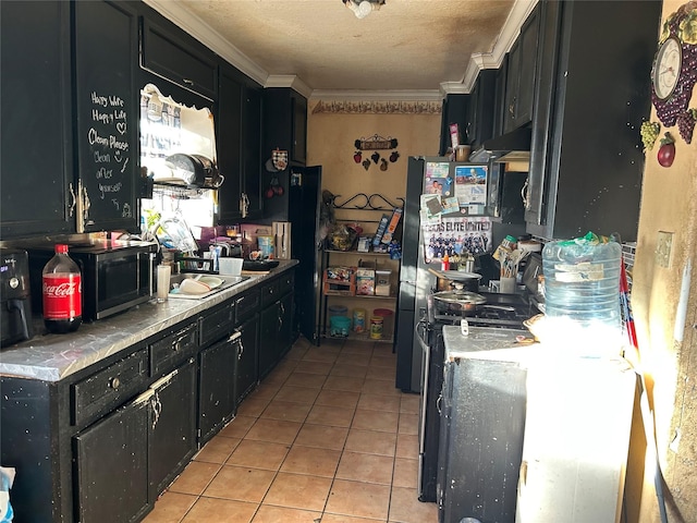 kitchen featuring sink, light tile patterned floors, and ornamental molding