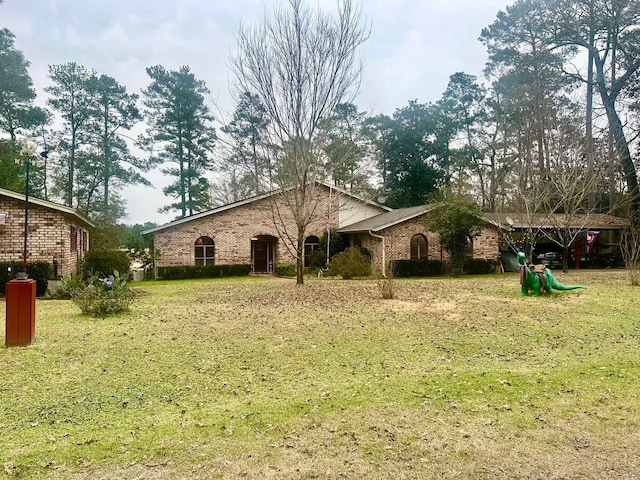 exterior space featuring a lawn