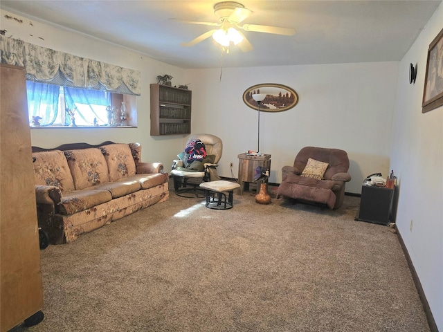 living room featuring ceiling fan and carpet flooring