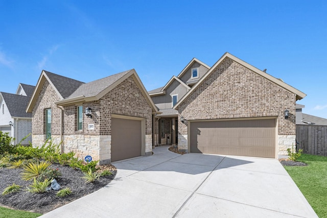 view of front of property with a garage