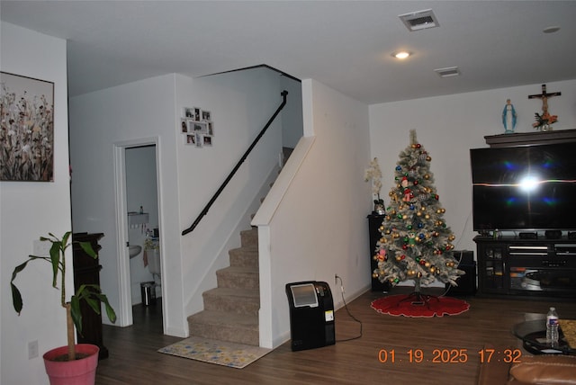 living room featuring dark hardwood / wood-style flooring