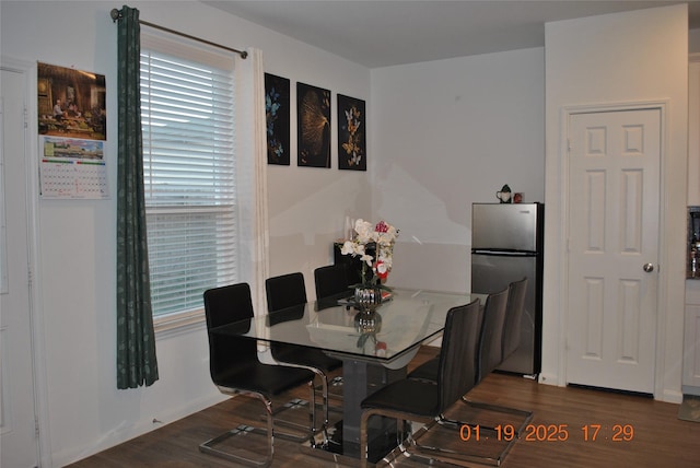 dining room featuring dark wood-type flooring