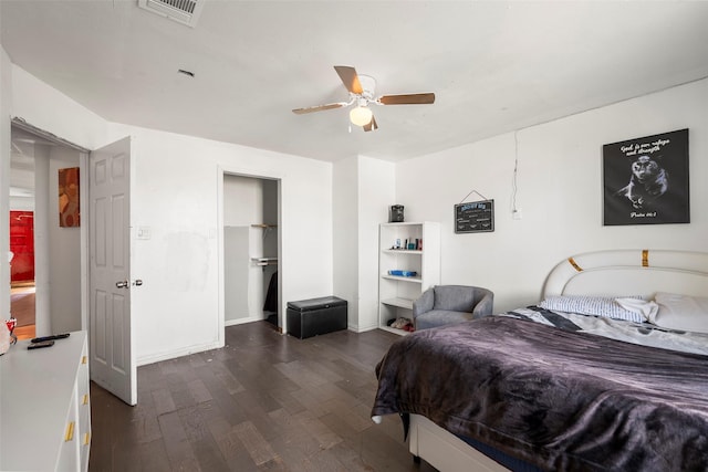 bedroom featuring ceiling fan and dark hardwood / wood-style flooring