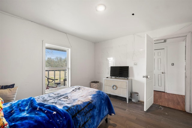 bedroom featuring dark wood-type flooring