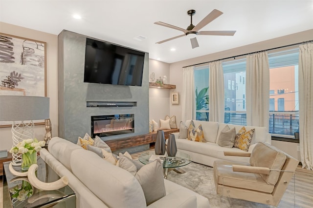 living room featuring ceiling fan