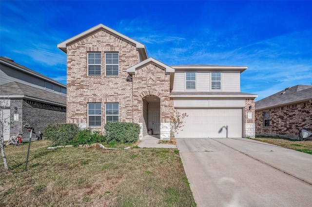 view of property with a front lawn and a garage