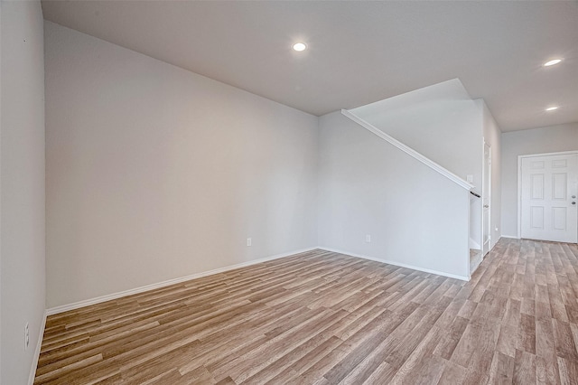 unfurnished room with light hardwood / wood-style flooring