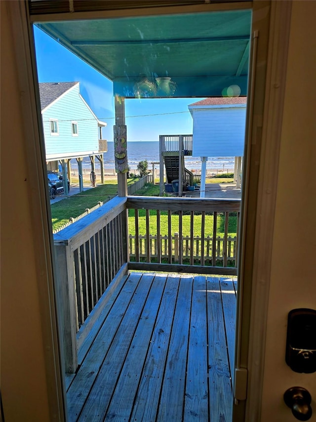 deck featuring a water view