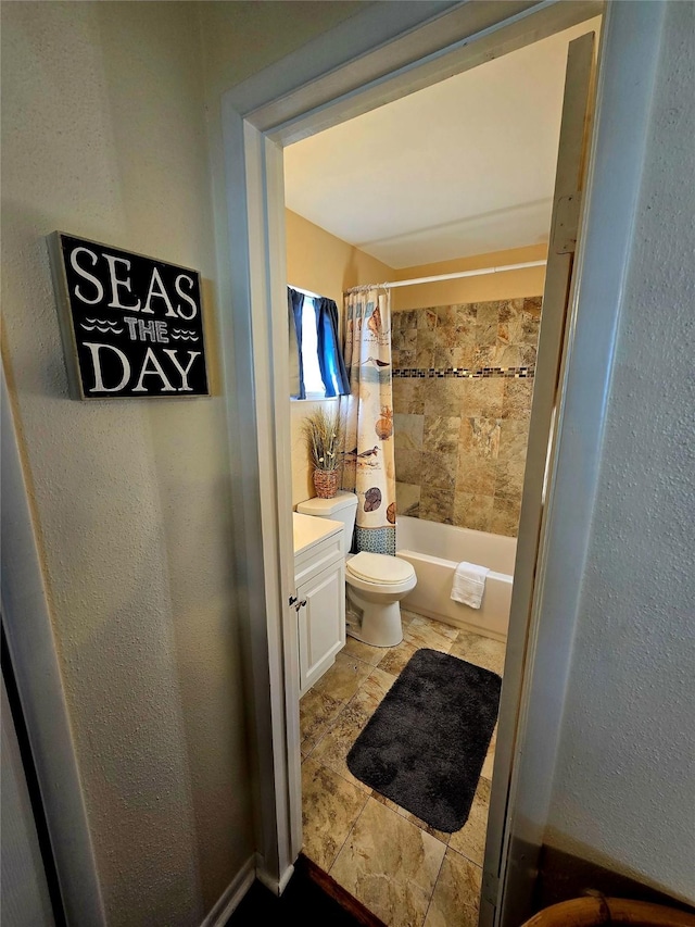 12929 John Reynolds Rd, Galveston, TX 77554 - bathroom featuring shower / bath combination with curtain, toilet, and vanity