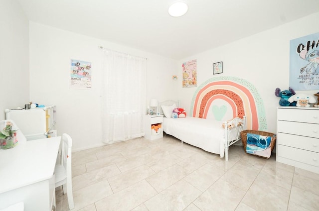 bedroom featuring light tile patterned floors