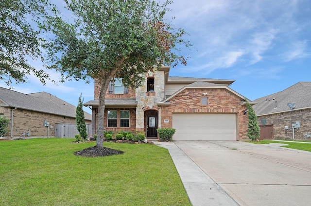 view of front property featuring a front yard and a garage