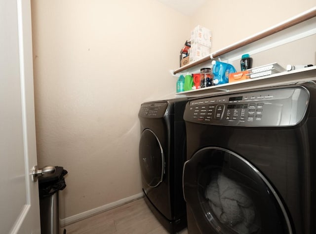 laundry area featuring washing machine and dryer