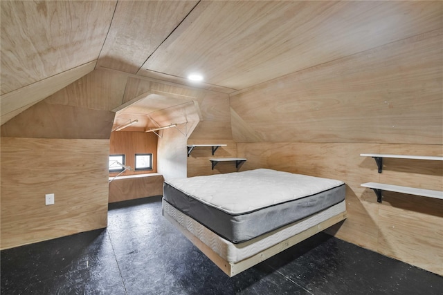 unfurnished bedroom with vaulted ceiling