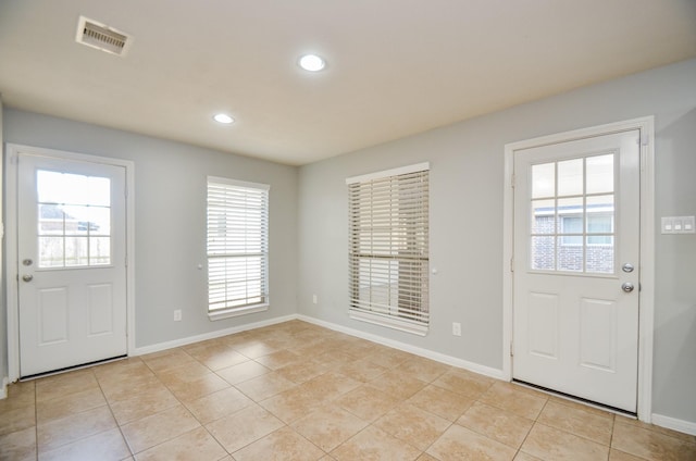 view of tiled entrance foyer