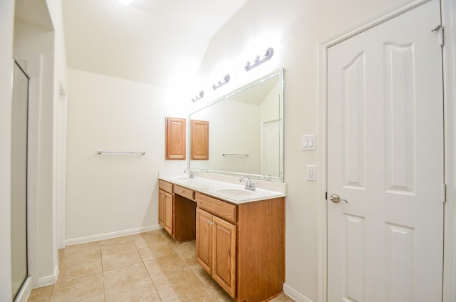 bathroom featuring vanity and tile patterned flooring