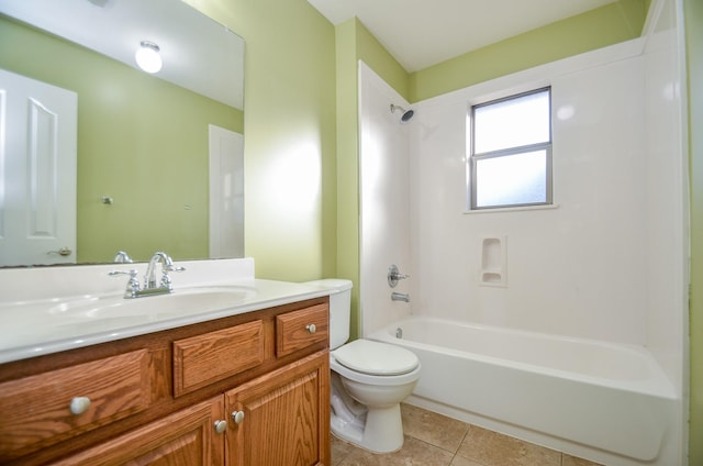 full bathroom featuring tile patterned floors, toilet, shower / washtub combination, and vanity