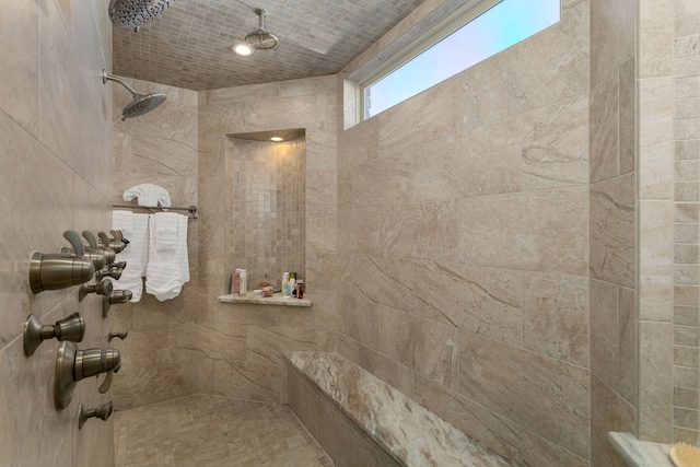 bathroom featuring tiled shower