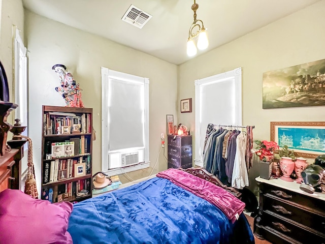 bedroom with cooling unit