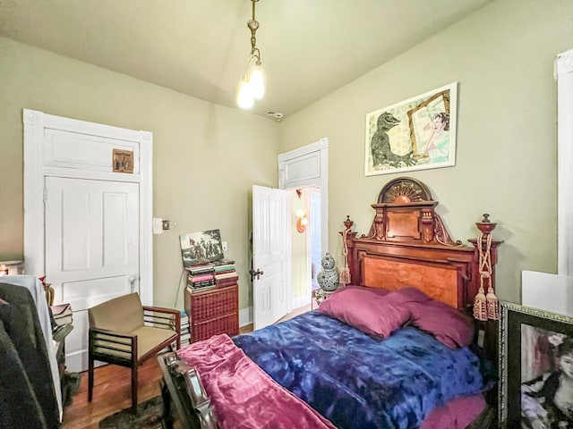 bedroom featuring hardwood / wood-style flooring