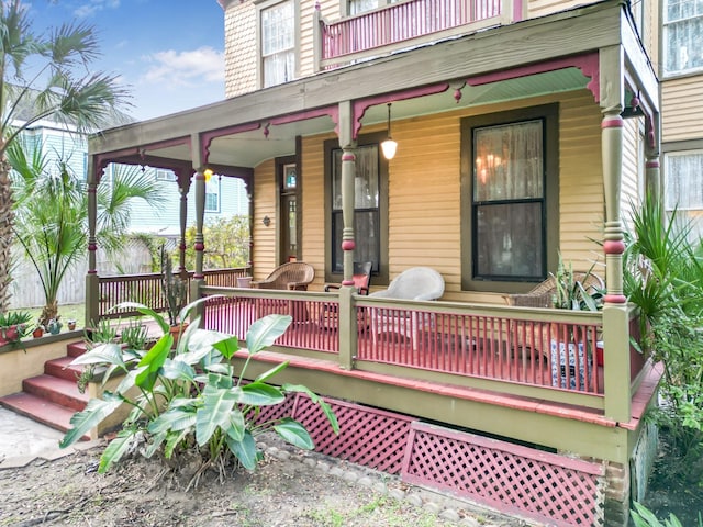 wooden terrace with a porch