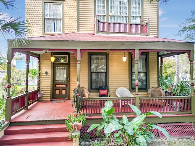 doorway to property with a porch